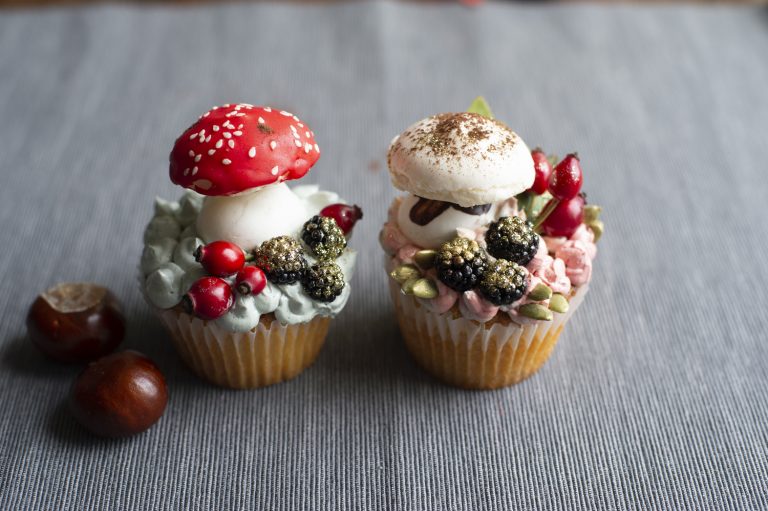 Cupcakes with sugar mushroom decorations