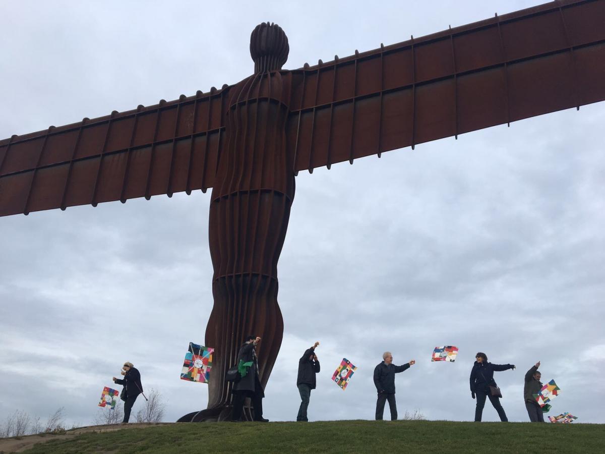 Equal Arts Carers’ Cultural Adventures’ Group flying their handmade Korean flags Photographer Dani Giddins