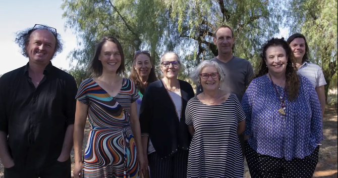 A photo of some of the founding group: Vic McEwan, Claire Hooker, Karen Kerkhoven, Christine McMillan, Helen Zigmond, Ian Thomson, Michele Jersky, Christopher Smith.