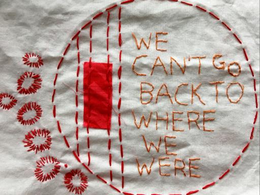 Embroidery by Geraldine Montgomerie - featuring the words "we can't go back to where we were" 