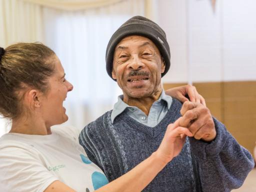 A man and woman dance together